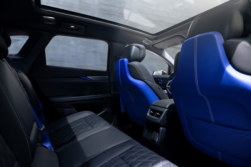 Back Seat View of the 2026 OPTIQ-V Blue Front Seats, Sun Roof, and Interior | Bical Cadillac in Brooklyn NY